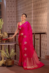 KAVVYA SOFT & LIGHT WEIGHT RANI CRAPE SAREE WITH SATIN BORDER AND BEAUTIFIL SILK ZARI WEAVING BORDER AND SMALL FLORAL MOTIFS ALL OVER THE SAREE AND BORDER COMES WITH SAME COLOUR WEAVED BLOUSE